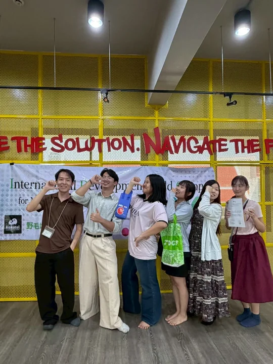 IDFC2026 participants posing with certificates at the venue