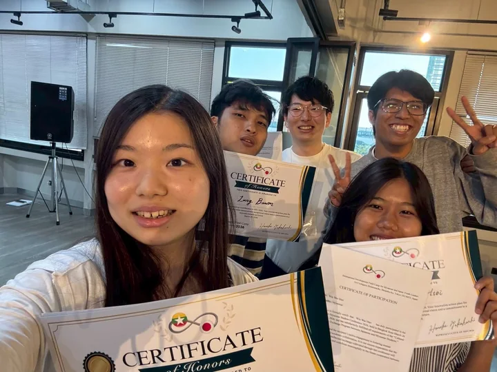 IDFC2026 participants smiling with their certificates